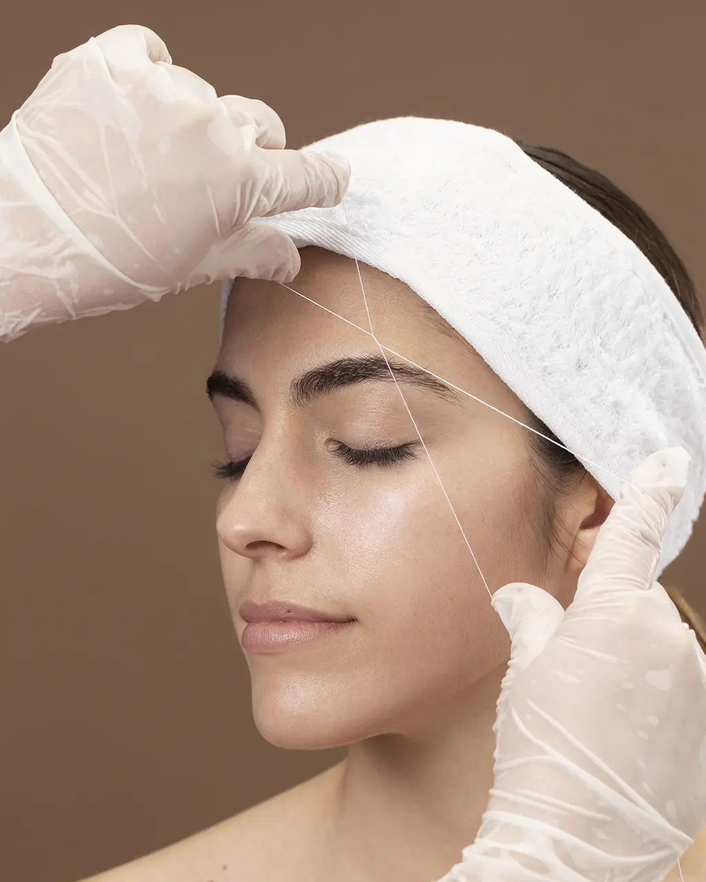 Woman undergoing a face thread lift procedure at Magnolia Medical & Aesthetics in San Antonio, TX